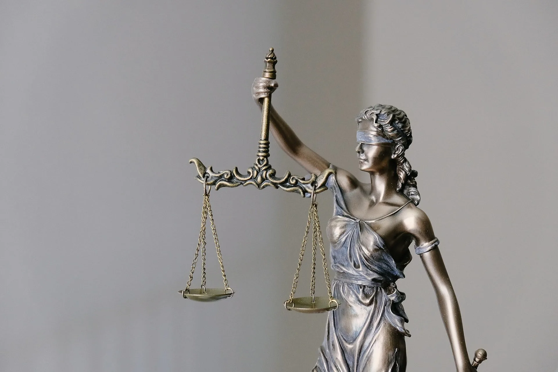 Lady Justice statue holding the scales of justice